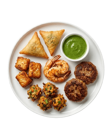 Mixed platter of fish bites, prawns, kabab, pakora and samosas