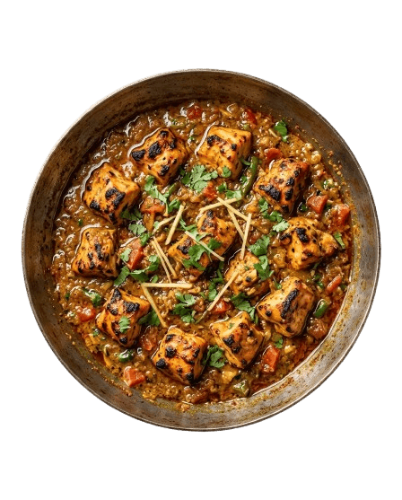 Tandoori Boneless Tikka Karahi in a handle-free metal karahi